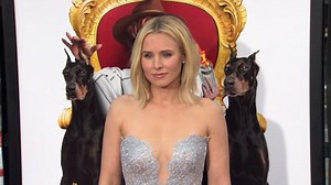 Kristen Bell is racy in lacy silver number at LA premiere of The Boss