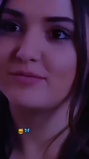 Close-Up Facial Features and Artistic Emoji Overlay