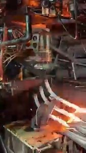 Each one of these red hot blobs are future glass bottles. The process of converting sand and other materials into glass is a mesmerizing process! Video/image credits: Phil Cook #engineering #technology #manufacturing #glass #art | Wevolver.com