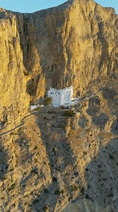 clip-3851876815-panagia-hozoviotissa-monastery-on-steep-cliffside-above