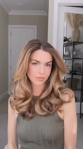 How I put in velcro rollers 💖 First, I apply a volume foam to create lift and hold. Then I use the Dyson Airwrap to rough dry my hair until it’s mostly dry. Next, I section all of my hair in order to keep things nice and clean. Four sections works great for me, but this will vary based on the amount of hair you have. Focusing on the mohawk section first, I round brush each section and then begin rolling. I like to hold my sections high and roll them in this position for the most volume. For the