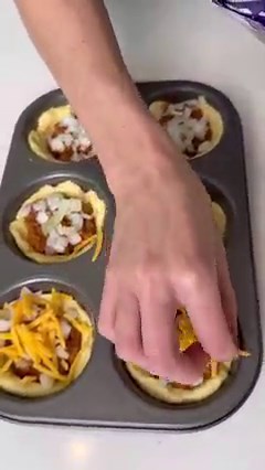 easy hot dog bites woman uses cupcake tray and biscuits to make mini hot dog cupcakes this video is a co production between network media productions and Laura Harwood | Southern Fried Cookin'