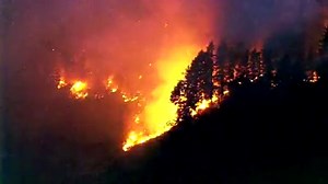 Air 4 flew over a wildfire burning in the hillsides above Sumner and Bonney Lake. SR 410 remains closed in the area. UPDATES HERE: https://komonews.com/news/local/8-homes-destroyed-in-graham-as-several-brush-fires-burn-amid-south-sound-windstorm | KOMO News