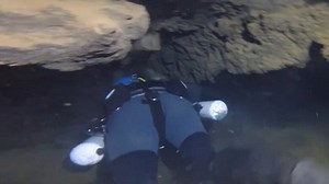 Don’t panic! Claustrophobic footage shows cave-diving instructors