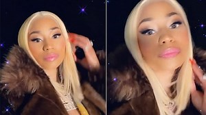 Nicki Minaj rocks fur coat and revealing yellow top on her Instagram page