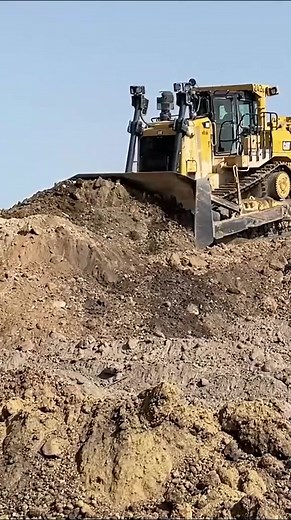 Caterpillar D9T Bulldozer Working At Huge Mining Site! Follow us for mor-001 Working On Follow us for more! Don't miss our ama #BulldozerPower, #HeavyMachinery, #ConstructionEquipment, #TruckLovers, #ExcavatorAddict, #CaterpillarTough, #BulldozerBeast, #ConstructionLife, #MachineryLove, #BigMachines, #EarthMover, #ConstructionSite, #HeavyDutyMachines, #TrucksAndMachinery, #ExcavatorOperator, #CaterpillarExcavator, #DozerPower, | SarahVargas