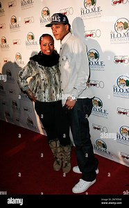 Shante Broadus, wife of Snoop Dogg, and son Corde arrives at H.O.M.E. Foundation's STIKS Celebrity Video Game Challenge held at Spot 5750. Los Angeles, CA. 01/11/11 Stock Photo - Alamy