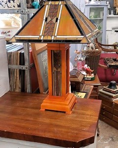 13 reactions · 4 comments | Tiffany style lamp. Wood and stained glass base lights up separately and the top has a 2 way. $180 #tiffanystylelamp #tiffanystyleshadeandwoodbaselamp #amberstainedglasstablelamp | The Garage & The Garage Girls - Antiques, Suffern, NY | Facebook