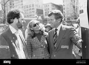 Sen. Edward Kennedy, right, and his wife, Joan Kennedy, chat with William Stein, left, during tour of solar exhibits on Boston Common, Wednesday, May 3, 1978, Boston, Mass. Stein is a builder of windmills. (AP Photo/MSG Stock Photo - Alamy