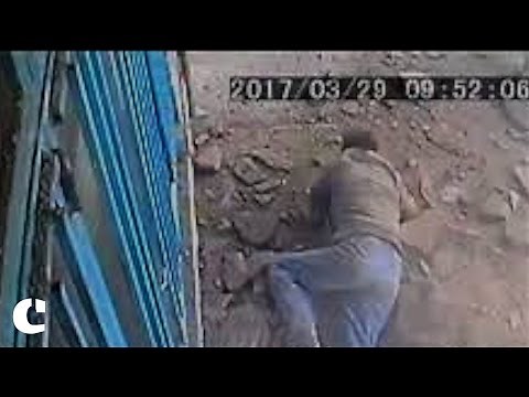 Sewer hole blows up in man's face as he drops cigarette butt in it in Tehran, Iran