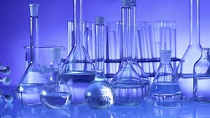 Modern Laboratory Equipment Set Different Glassware Blue Background Dolly Shot