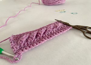 Crochet twisted cable stitch tutorial (with no post stitches!) - Dora Does