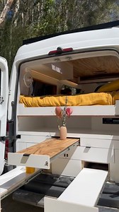 We decked out this Mercedes Sprinter with an outdoor and indoor dining area, large bed, loads of storage, in built 2 burner stove top, fridge, sink, outdoor shower, wall fan, lighting, USB ports, and a skylight which takes you up onto the roof top deck 🤌🏽✨ This van is now available for HIRE. You asked, we delivered. We have two Mercedes Sprinters to choose from, ready for your next road trip. Find The RA and The ZEUS on Camplify. Pick up in Byron Bay 🐨 | Byron Bay Van Fitouts
