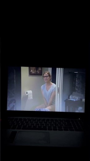 Andrea Savage on the toilet