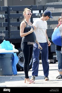 Pregnant Behati Prinsloo visits husband Adam Levine on the set of his new music video in downtown Los Angeles. Actor Vince Vaughn is also seen on the set wearing a pokemon costume for a cameo in the scene.  Featuring: Behati Prinsloo Where: Los Angeles, C Stock Photo - Alamy