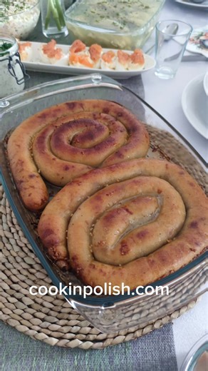 Our last year Easter breakfast table, with the blessed basket essentials – kiełbasa, fresh bread, and hard boiled eggs – along with eggs in mayonnaise, eggs with tartar sauce, assorted cold cuts, tangy ćwikła, rich pâté, colorful vegetable salad, decadent bacon in aspic, and classic herring. Żurek was not on a table then, as it was being warmed up in the kitchen😍 Here are Polish Easter food recipes to browse and pick your favourite. Plan your Polish Easter now: https://cookinpolish.com/category