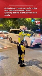 204K views · 2.7K reactions | China has started deploying robots to manage traffic, monitor violations and assist with basic road safety duties in select locations, with authorities citing efficiency gains even as videos of robotic traffic control trigger public debate over jobs and safety. [China, Traffic police, Robots] #ETTrendingNow | ET NOW | Facebook