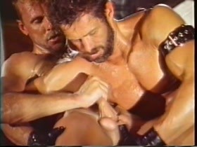 Leatherman Works over Muscly Blond