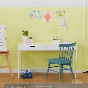 This two-toned wall is a colorful eye-catcher. http://bit.ly/2JEXzSz | HGTV