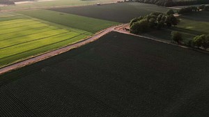 Download Aerial view over a farm field for free