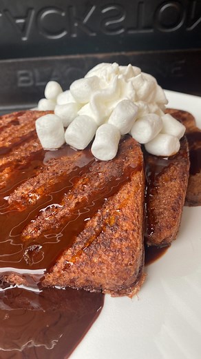 Hot chocolate French toast!! 1cup half and half 4eggs 1/4cup cocoa powder 1/8cup sugar Splash of vanilla 10 slices of bread Topped with chocolate sauce whipped cream and marshmallows enjoy! #blackstonegriddle #griddlecrew #frenchtoast #breakfast #reels #réel #reel #christmas #christmasmorning #hotchocolate | Cook n woods