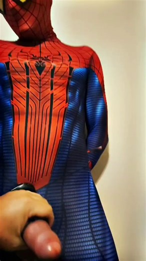 The black cage is on Spidermans huge hard dick and causing him to feel alot of pressure on his huge hard dick, Throbbing hard against his black cage he is moaning and suffering as I have Spiderman in my control by using his dick as a torturing device to make him pay for his dick