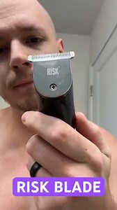The RISK Blade from Skull Shaver is an attachment for the Baby Beast trimmer. You can get a VERY close shave with this making it perfect for sideburns, neck lines, and close trims! #skullshaver | Skull Shaver