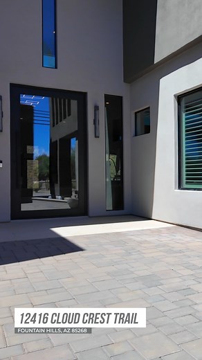 Stunning contemporary home in gated Eagle Ridge, 📍12416 N Cloud Crest TRL, Fountain Hills, AZ 4 Bed | 4.5 Bath | 5,281 sq. ft. | $4,300,000 Click here for details: https://sonoranlifestyle.com/.../12416-n-cloud-crest... Stunning contemporary home in gated Eagle Ridge, completed in 2022, blends luxury with sparkling city and mountain vistas. A grand entry with 10' steel door opens to jaw dropping living spaces. The elegant media area features an 8' fireplace, cocktail area, and full bar. The che
