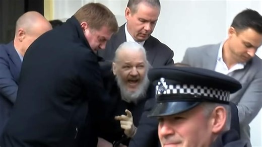 Julian Assange charged by US after being arrested by UK police in Ecuadorian embassy