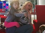 Squat Challenge! Coco Austin squats wearing heels with her daughter on her back