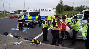 Climate protesters blockading M25 dragged away by police