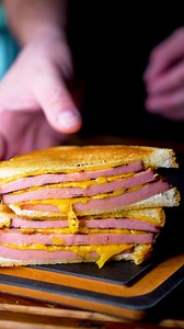 19K views · 326 reactions | Smoked & Fried Bologna Sando! . Roll of Bologna, scored and seasoned. Lil’ @fyrstarter Gld hot sauce for a binder. Smoked low and slow. Sliced and fried up with some cheese. Few slices of toasted bread and we’re golden. . . . : @thekitchenwhitelaw . . . #TheKitchenWhitelaw #bologna #smokedbologna #friedbologna #bolognasandwich #bbq #smokedbbq #grill #castiron #castironcooking #laborday #labordayweekend #labordaybbq | The Kitchen Whitelaw | Facebook