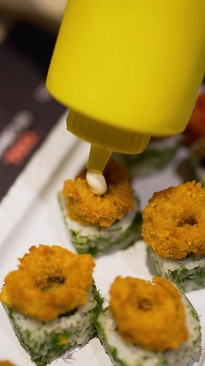 The URA CALAMARI Roll is here 🤩🥢 . . #sushi #sushitime #sushilovers #sushiroll #sushiporn #calamari #salmon #tuna #shrimp #raw #new #fresh #seafood #foodie #dailyfoodfeed #reels #reelsinstagram #viral #viralreels #eeeeeats #foodporn #video #ordernow #delivery #w#vibes #weekend #thursday 🧡 | AMA SUSHI