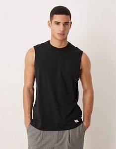 Calvin Klein Jeans jersey badge muscle vest in black | ASOS