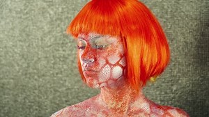 clip-25943453-young-woman-body-art-bright-wig