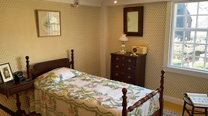 Last week, The House of the Seven Gables introduced its first 20th-century room to the Mansion Tour! The Settlement Worker’s Bedroom, formerly known as the Dining Room Chamber, has returned to its early 1950s appearance when it served as living quarters for social workers of the Settlement Association. Renovations included adding new wallpaper and paint, making lighting improvements, and, of course, adding furniture, images, and historical touches that bring the space to life. Have you seen the 