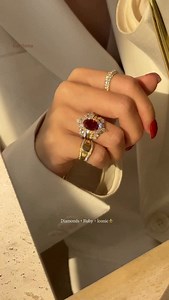 Luxury in every layer🔥 Featuring✨ ♥️The Gloria, 4ct Elongated Lab-Grown Oval-Cut Ruby Halo Cathedral Ring ♥️The Isabella, Double-Row V-Shaped Diamond Band ♥️The Renee, Signet Double Curved Diamond Pinky Ring Stack ♥️The Remi, Pavé Dome Diamond Ring ruby halo ring // natural ruby engagement ring // lab-grown ruby engagement ring // oval-cut ruby diamond ring // cathedral setting ruby ring // double row diamond band // v-shaped diamond band // diamond pinky ring // luxury pinky ring stack // gold