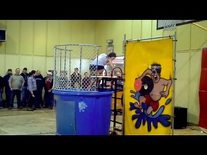Total Babe in White Tank Gets Dunked Repeatedly During Her Shift in the Dunk Tank
