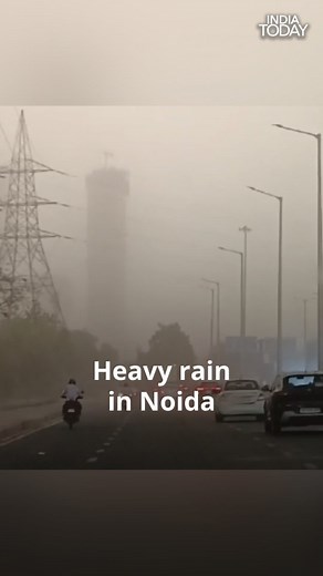 Rain with strong winds witnessed in several parts of Noida giving residents a sigh of relief from the scorching heat. #ITReels #Noida #Rain #Weather | (Shailendra Kumar) | India Today