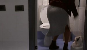 Women has diarrhea in public bathroom and gets embarras