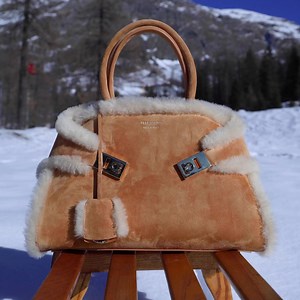 Discover the #FerragamoWinterEscape collection made with super-soft leathers for timeless style during magical winter atmospheres. | FERRAGAMO