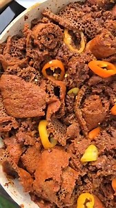 Firfir topped with fresh pepper and a sprinkle of berbere. Colorful and very appetizing. Have you ever tried Firfir before? .. (📸: @bellahana1 Via Instagram) Join the Moya Fam for Ethiopian food content @balemoya .. #ethiopianfood #ethiopia #eastafricanfood #africanfood #balemoya | Balè Moya