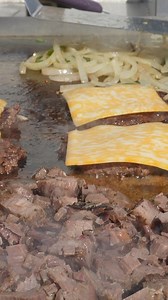 Smashed BBQ Brisket Sandwich. Yep, you heard that right! Loaded with juicy brisket, grilled onions, and melted cheese. Would you eat this? #BigPoppaSmokers #Brisket #BBQSmash #CookingWithBigPoppa | Big Poppa Smokers