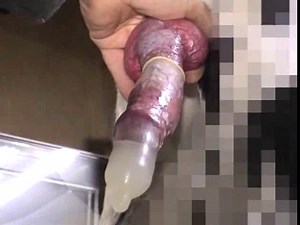 Proud dog owner captures enormous load of cum in a condom and shows it off on live cam