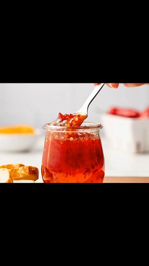 Get ready to brighten your pantry with this sweet and spicy Peach Pepper Jelly! Perfect for spreading on toast or serving with cheese. 🍑🌶️ Ingredients: - 1 lb red peppers (Fresno, red jalapeno, or red serrano), seeds removed and finely chopped - 6 cups granulated sugar - 1 cup apple cider vinegar - 32 oz frozen peaches, thawed - 1/2 cup water for peach juice - 3/4 cup water for pectin - 1 box Sure Jell powdered pectin (1.75 ounces) - 3 Tbsp butter (salted, optional) Directions: 1. Prepare your
