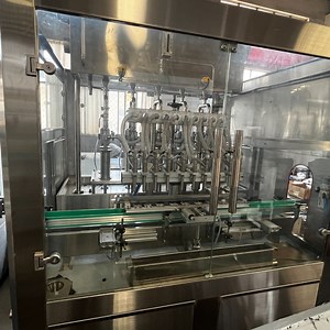 [Hot Item] Full Auto Linear Type Bottling Machine Glass Bottles Syrup Filling Machine
