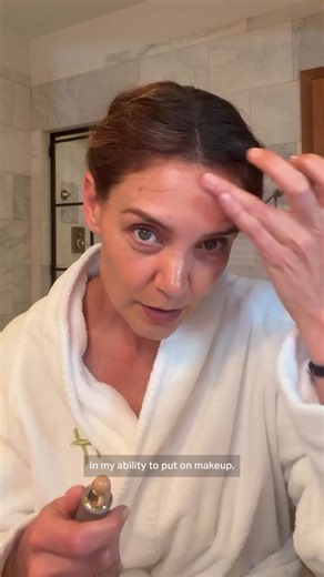 Barefaced Katie Holmes shows off all 'natural' look in stripped back bathroom video