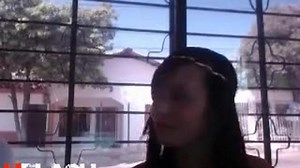 Putting on a naked show for onlooker at window