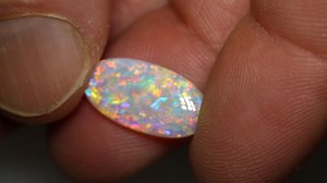 3.9K views · 266 reactions | Andamooka Crystal Opal sparkling in all its glory ✨️ A beautiful mix of floral and flagstone patterns showing an array of vibrant colors  3.67ct gem crystal opal 17.7×9.2×3.2mm https://blackopaldirect.com/product/opal/crystal-opal/3-67-ct-gem-crystal-opal-17-7x9-2x3-2mm/ | Black Opal Direct | Facebook