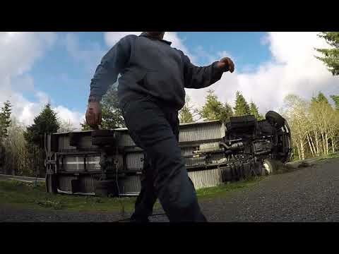 MOVING VAN ON ITS SIDE